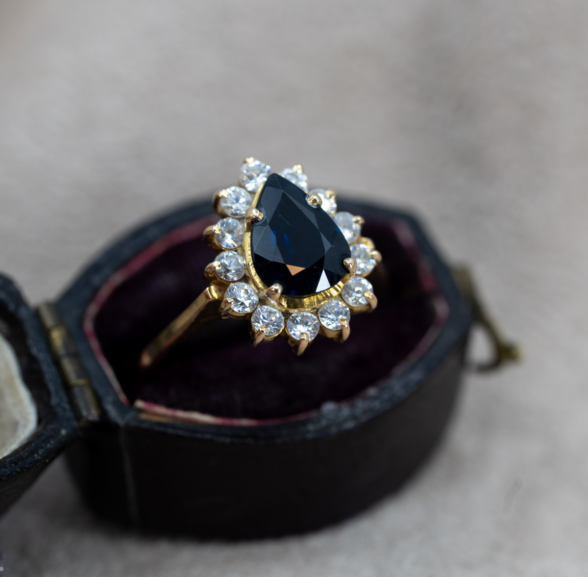 Pear Cut Sapphire & Diamond Boarder Ring